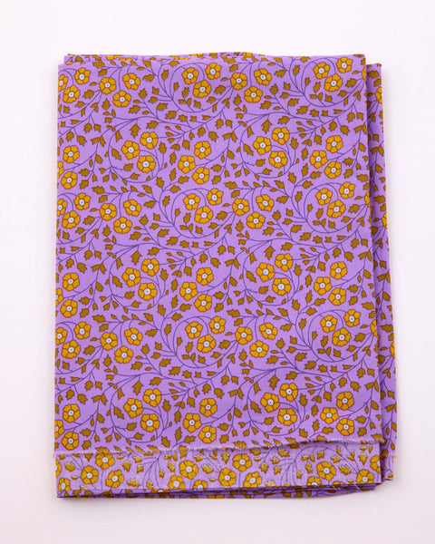 Coton 25M imprimé Aziza lilas avec des motifs fleuris