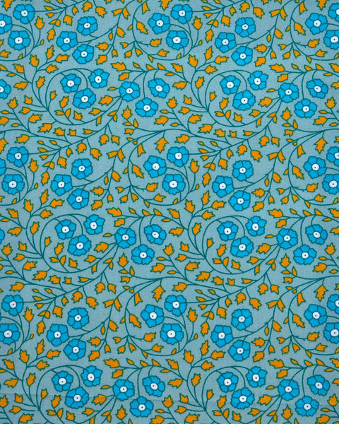 Coton enduit Aziza gris bleuté avec des motifs fleuris