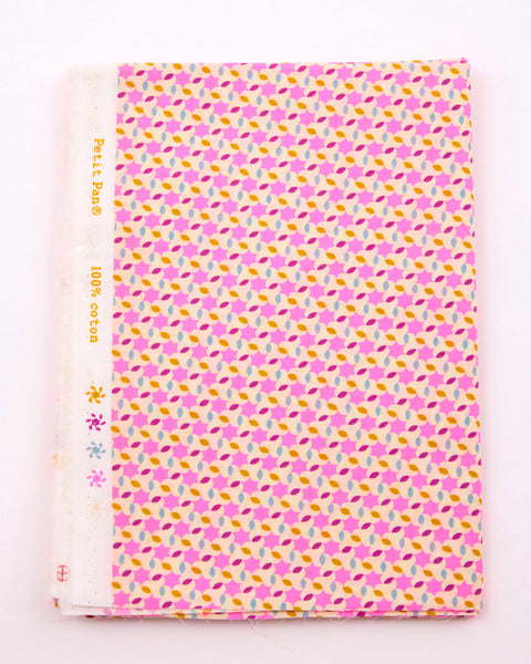 Coton imprimé Moussem rose avec des motifs géométriques