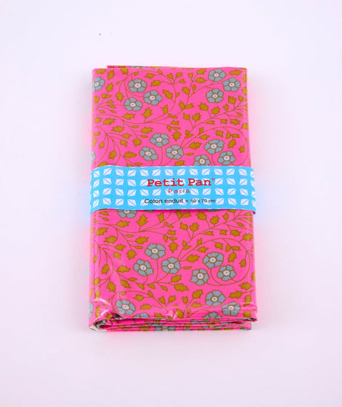 Coupon coton enduit Aziza rose avec des motifs fleuris