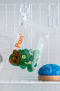 Assorted buttons (green)