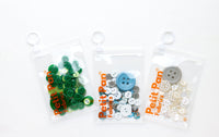 Assorted buttons (green)